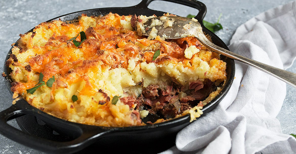 Corned beef cottage pie in cast iron skillet