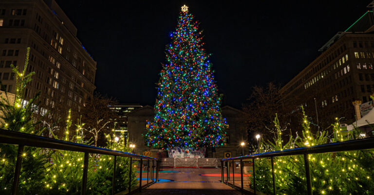christmas tree lit up at night at Pioneer Courthouse Square in Portland, Oregon