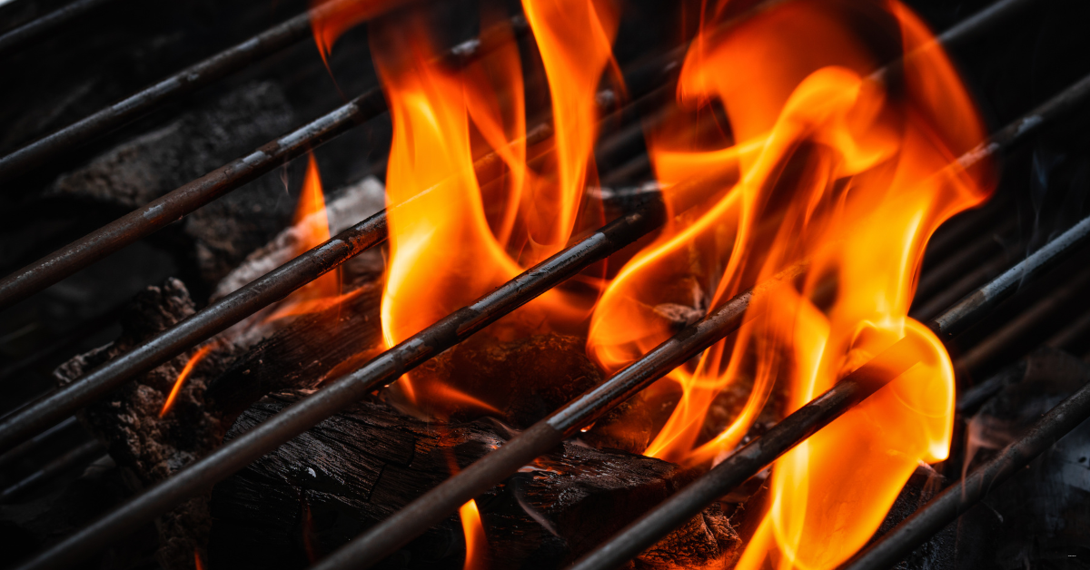 flames going through grill grates