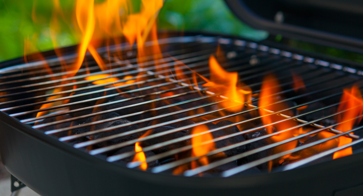 grill grates with flames coming through them